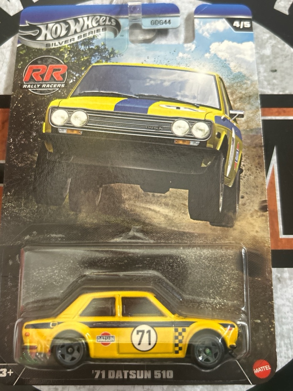 Hot Wheels '71 Datsun 510 Rally Car - Yellow with Blue Stripe